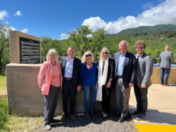 Several State Leaders smile together outside Eldridge Memorial