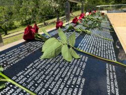 Flowers on name plaques of Eldridge Memorial